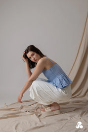 SMOCKED POPLIN PEPLUM TOP