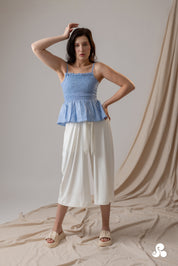 SMOCKED POPLIN PEPLUM TOP