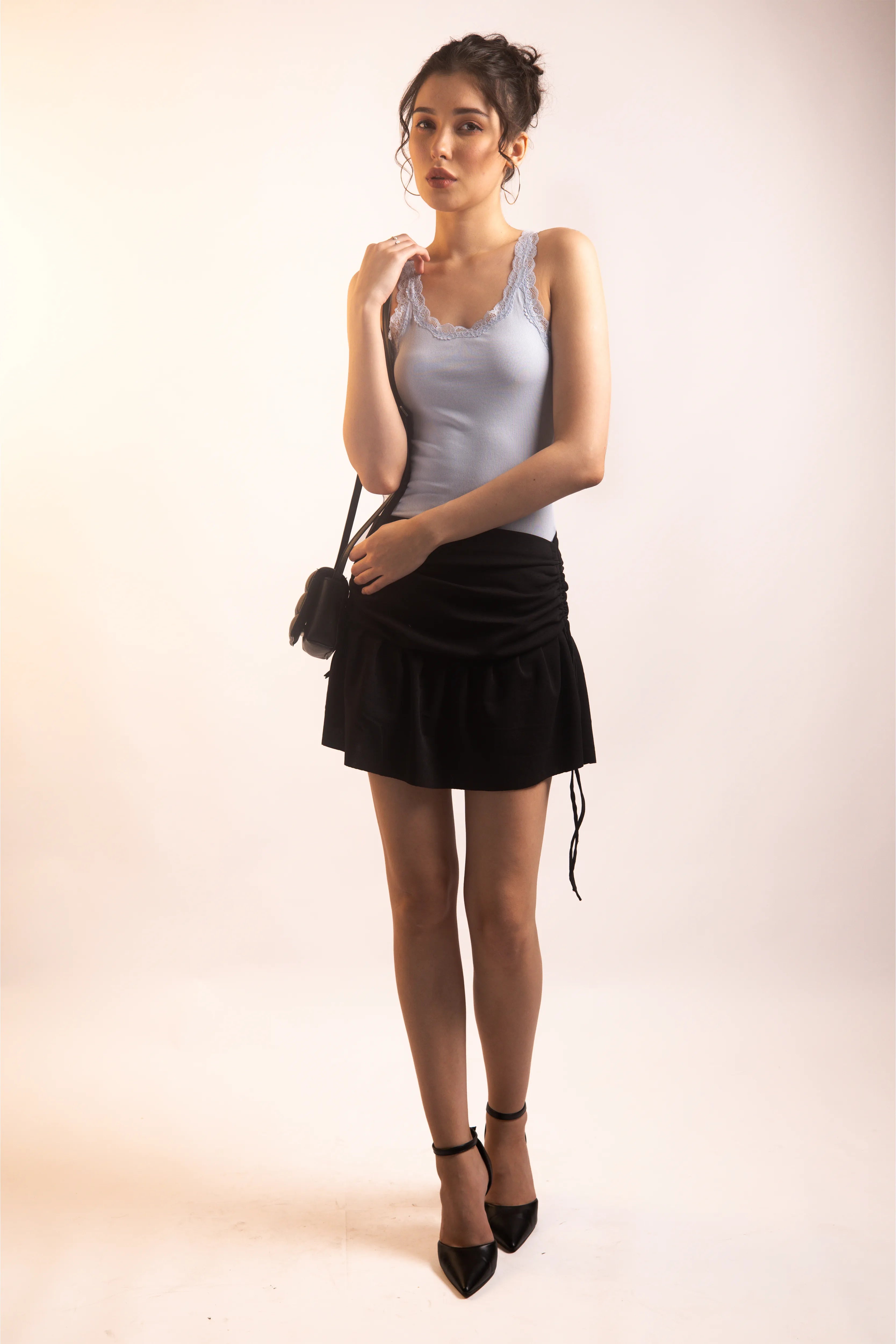 BLACK SCULPTED MINI SKIRT
